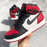 JORDAN 1 BLANCO/NEGRO/ROJO